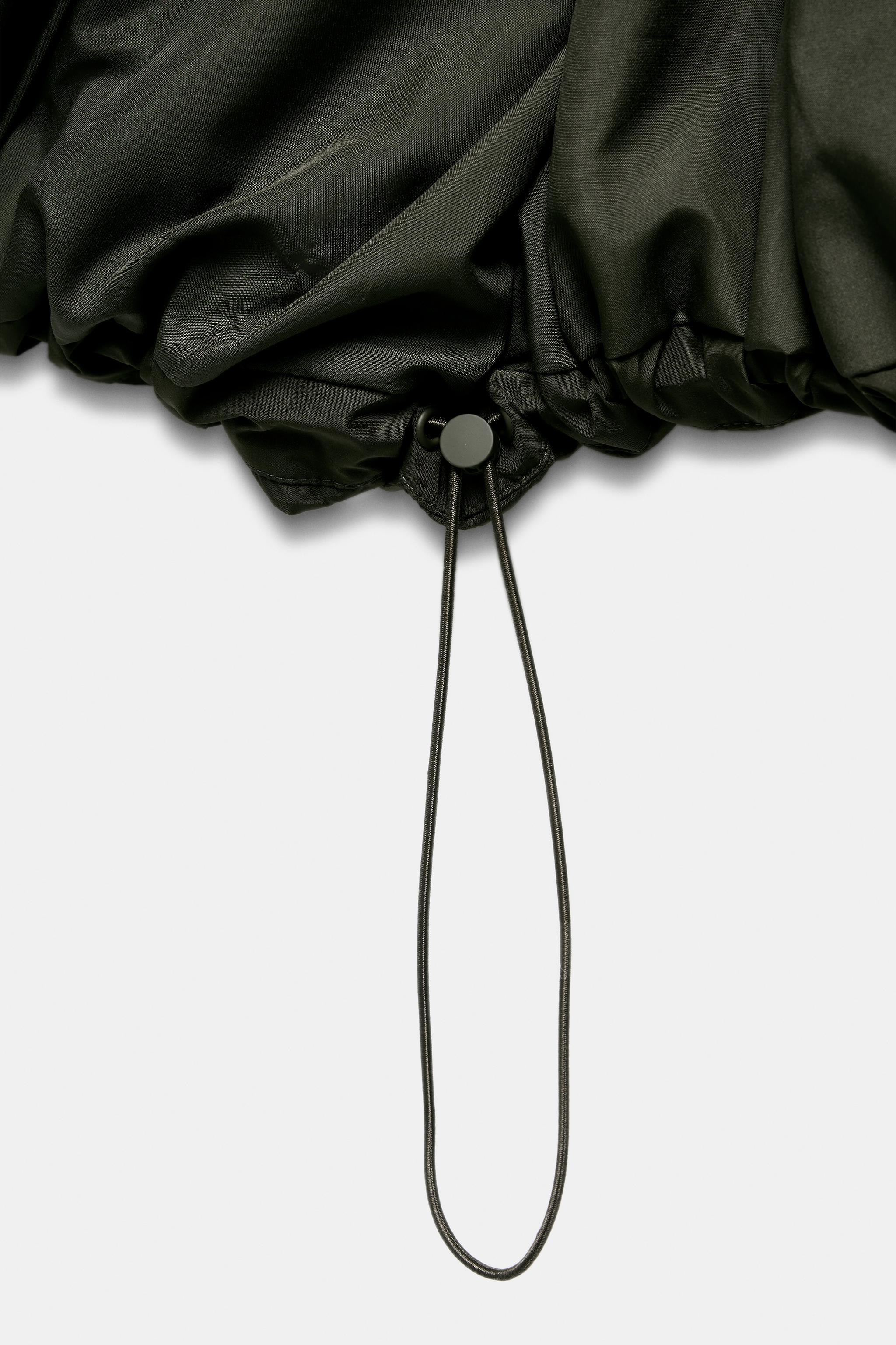 ANORAK COURT À CAPUCHE DÉPERLANT COUPE-VENT